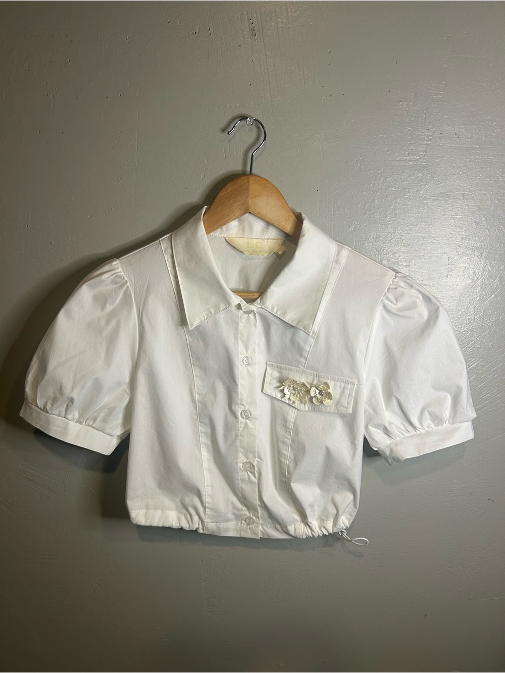 Cropped White Puff Sleeve Button-Front Top with Floral Accent